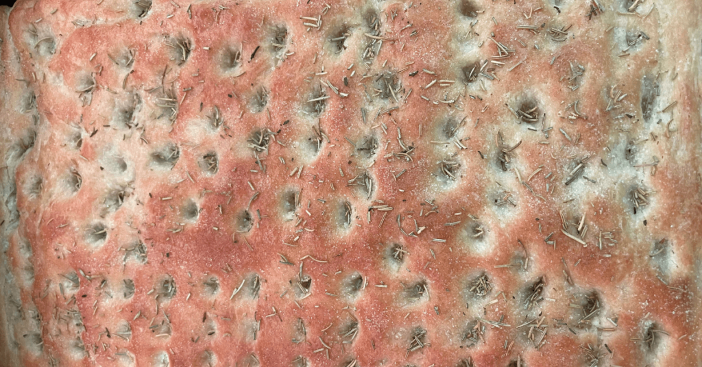 up close shot of baked focaccia bread