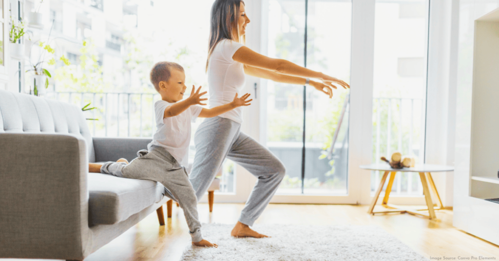 mother and son doing a workout together in their living room