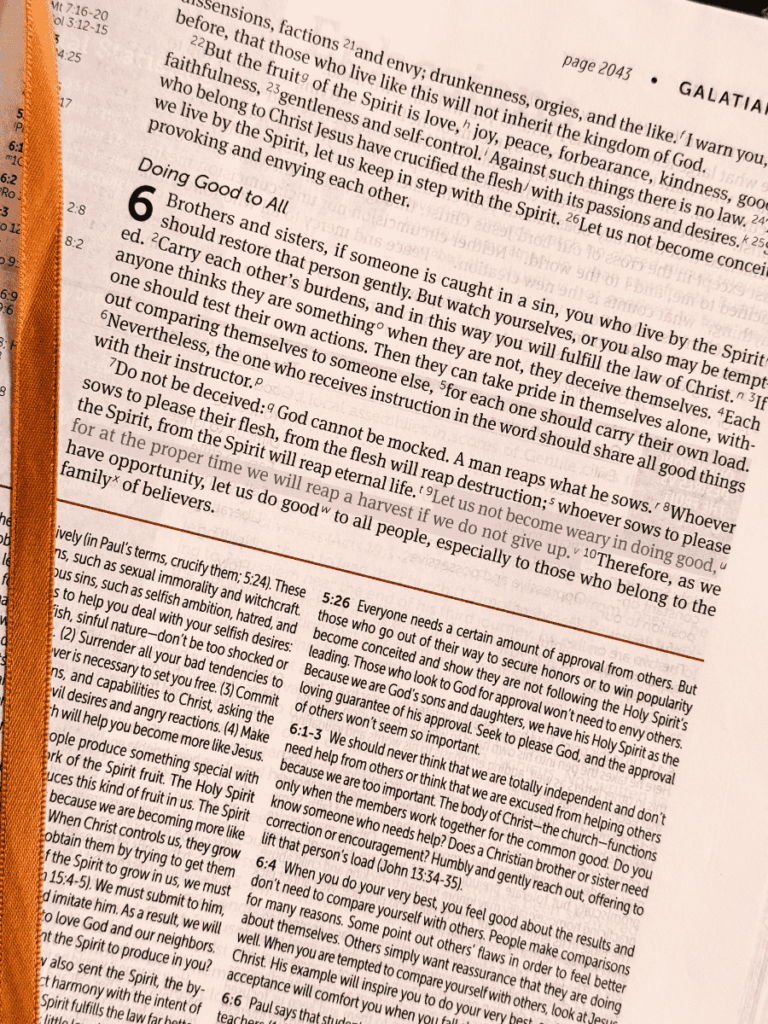 bible opened to Galatian 6 with verse 9 highlighted