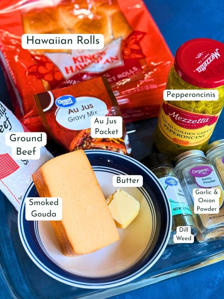 mississippi slider ingredients: hawaiian rolls, pepperoncinis, Au Jus Packet, Ground Beef, Smoked Gouda, Butter, Dill Weed, Garlic Powder, Onion Powder